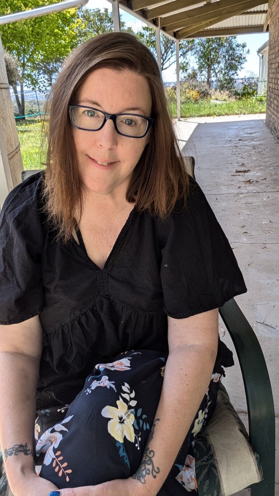 Photo Of Lorrene Sitting on a chair 